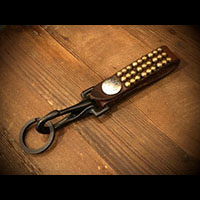 METAL JACKET BK01 THREE BEAD KEY FOB BROWN